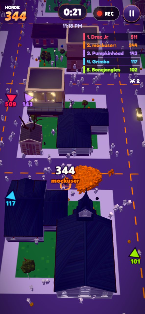 A huge orange horde of 344 monsters fills the street between houses near midnight.